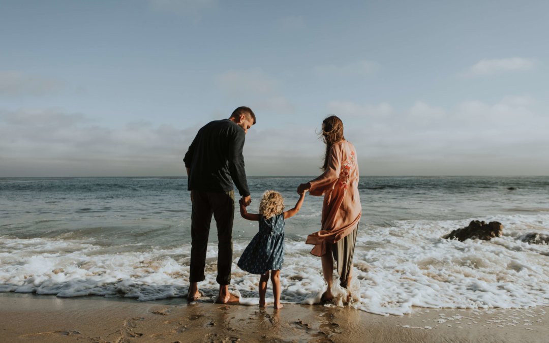 family on holiday at the beach