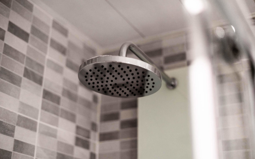How common is it for elderly people to stop showering and what might be the reasons?