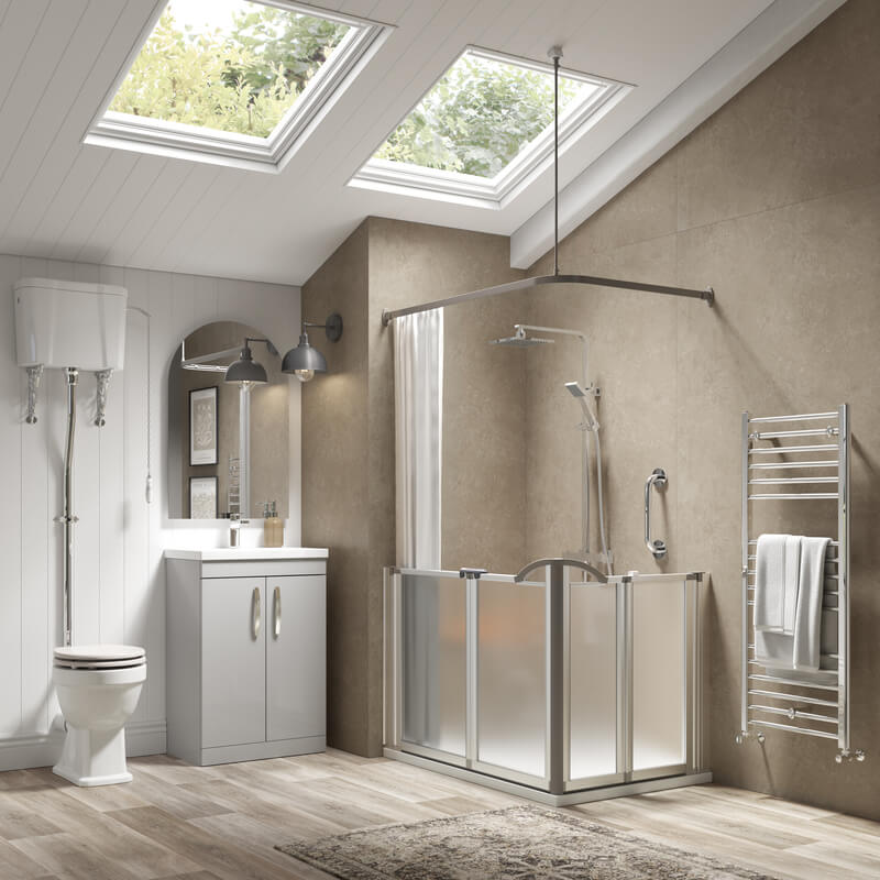 The spacious Imperial walk-in shower with a fold-down seat and hand shower.